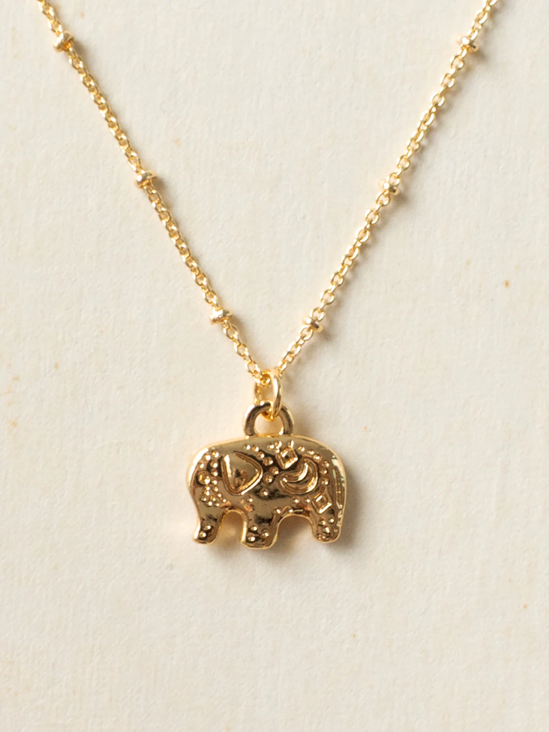 Resort Necklace, Gold - Carved Gentle Elephant